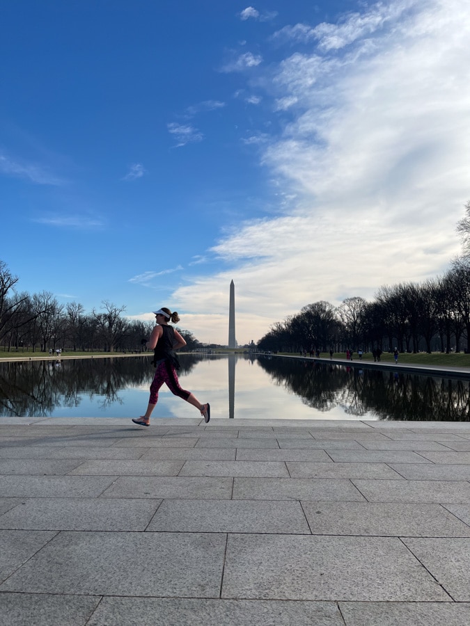 anne mauney running by the reflecting pool in DC