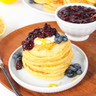 blueberry chia jam on top of a stack of lemon pancakes