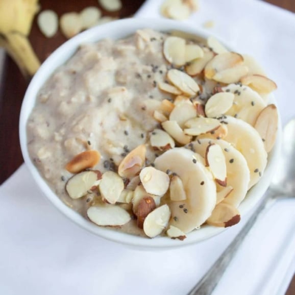 oatmeal in a bowl with banana and oats
