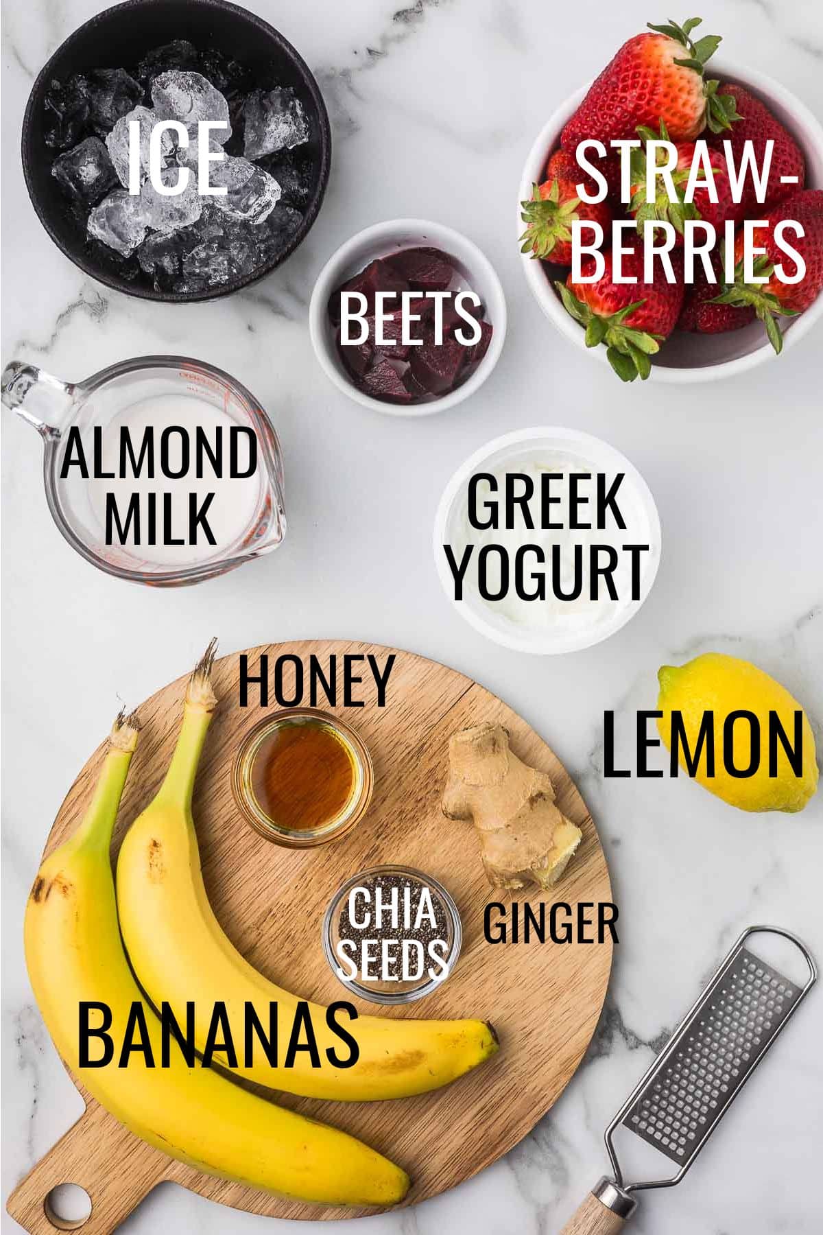 beets, strawberries, bananas, lemon, almond milk, Greek yogurt, ginger, honey, chia seeds, and ice in small bowls